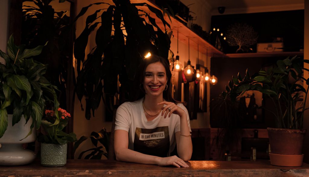 Smiling girl in restaurant