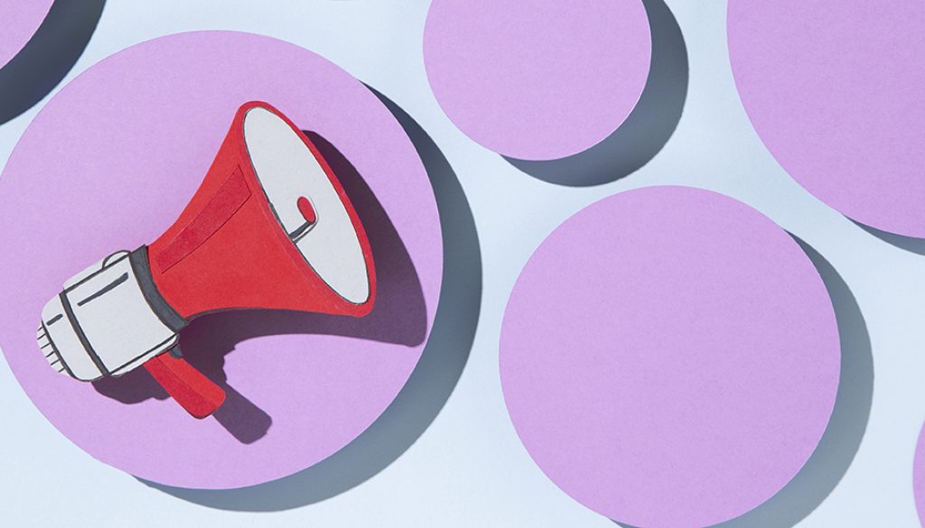a color illustration of a red megaphone in a light purple circle with other light purple circles around it