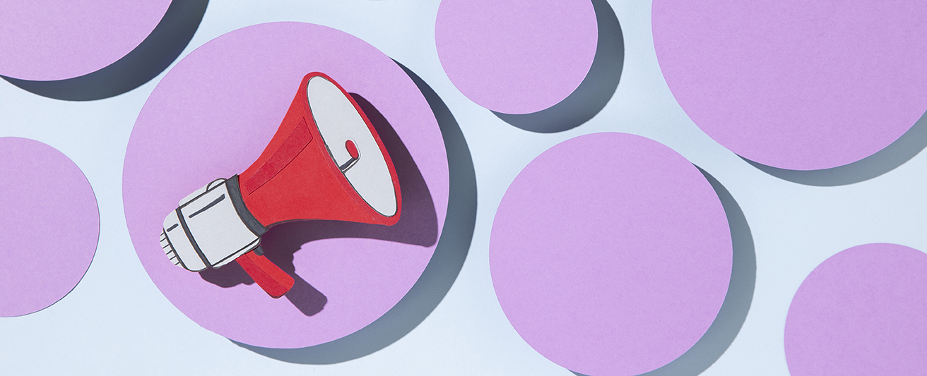a color illustration of a red megaphone in a light purple circle with other light purple circles around it
